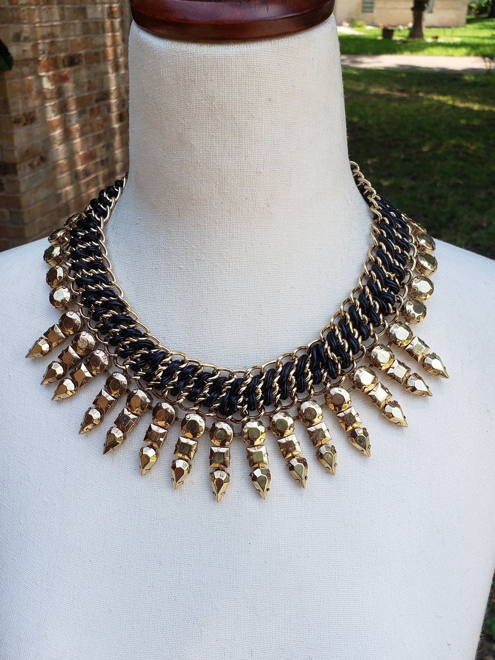 BCBGMaxAzria Gold and Black Spike Bib Necklace